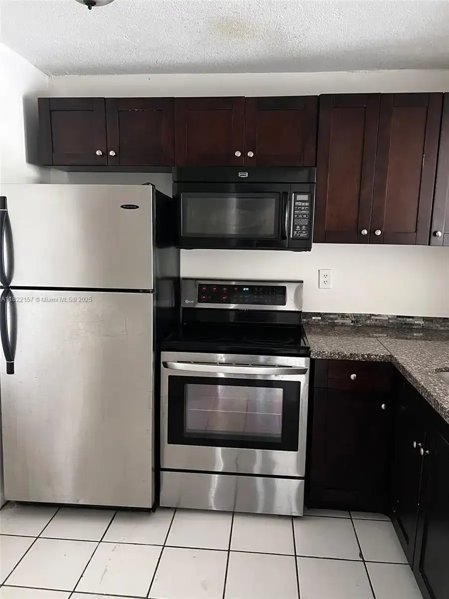 498 NW 165th St Rd # D303, Miami FL 33169