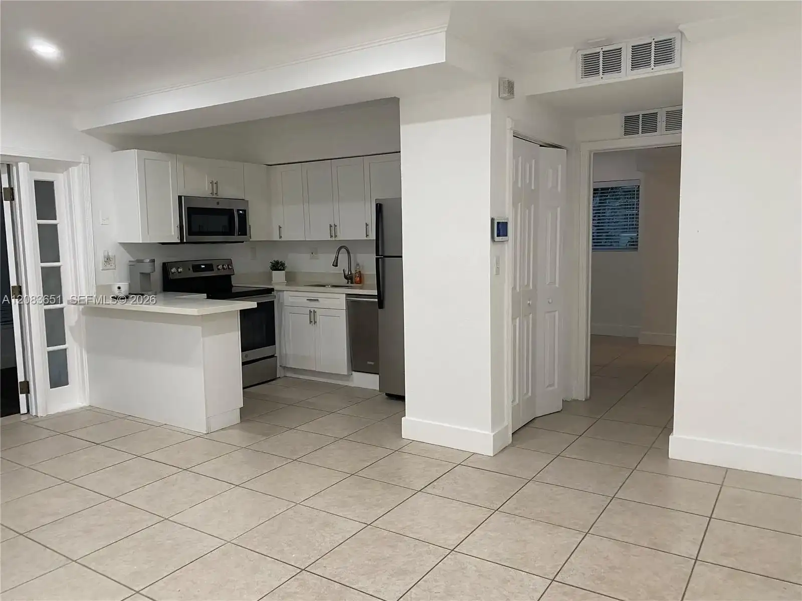 1 Edgewater Dr + DEN # 103, Coral Gables FL 33133