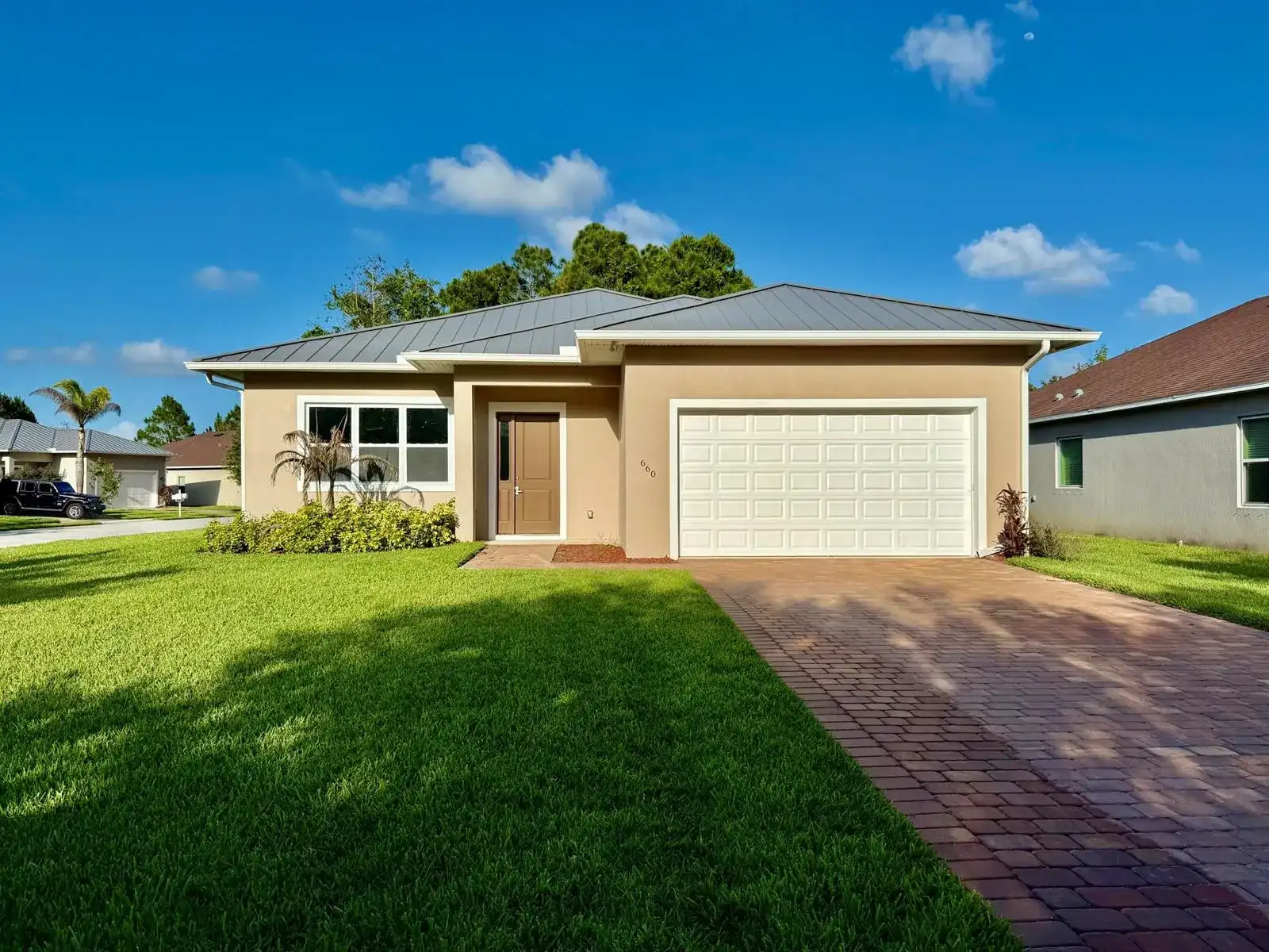 660 NE Moss Rose Place, Port St. Lucie FL 34983