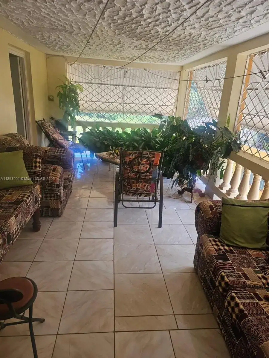 00 Mandeville, Manchester Hills Jamaica, FL photo 5
