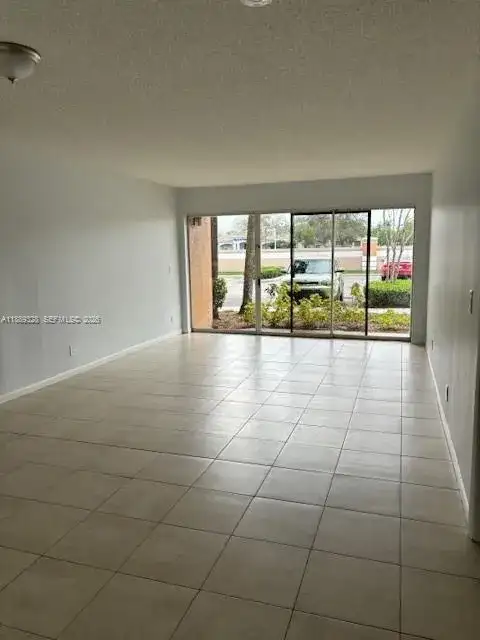 8977 Wiles Rd # 103, Coral Springs FL 33067 photo 2