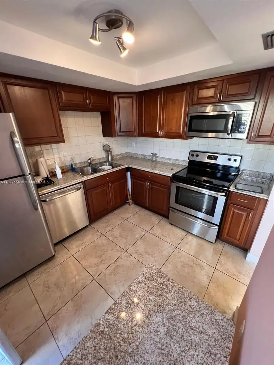 1591 NE Miami Gardens Dr # 107, Miami FL 33179 photo 2