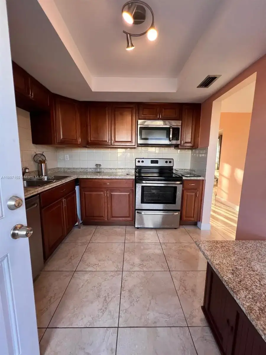 1591 NE Miami Gardens Dr # 107, Miami FL 33179 photo 3