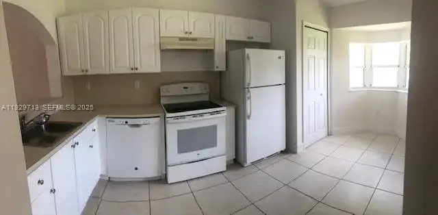 945 NE 33rd Ter # 203, Homestead FL 33033 photo 4