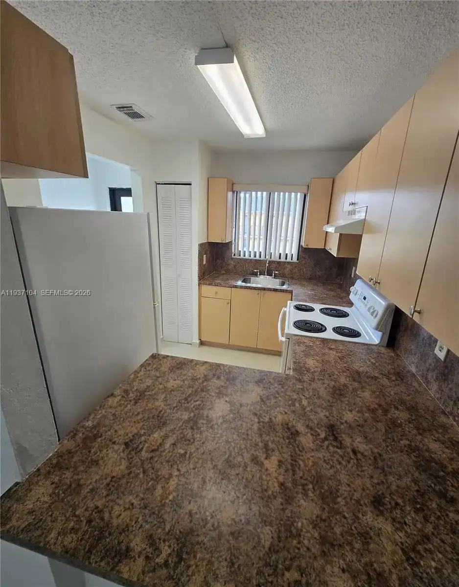 6151 W 24 Ave # 207, Miami FL 33016 photo 4