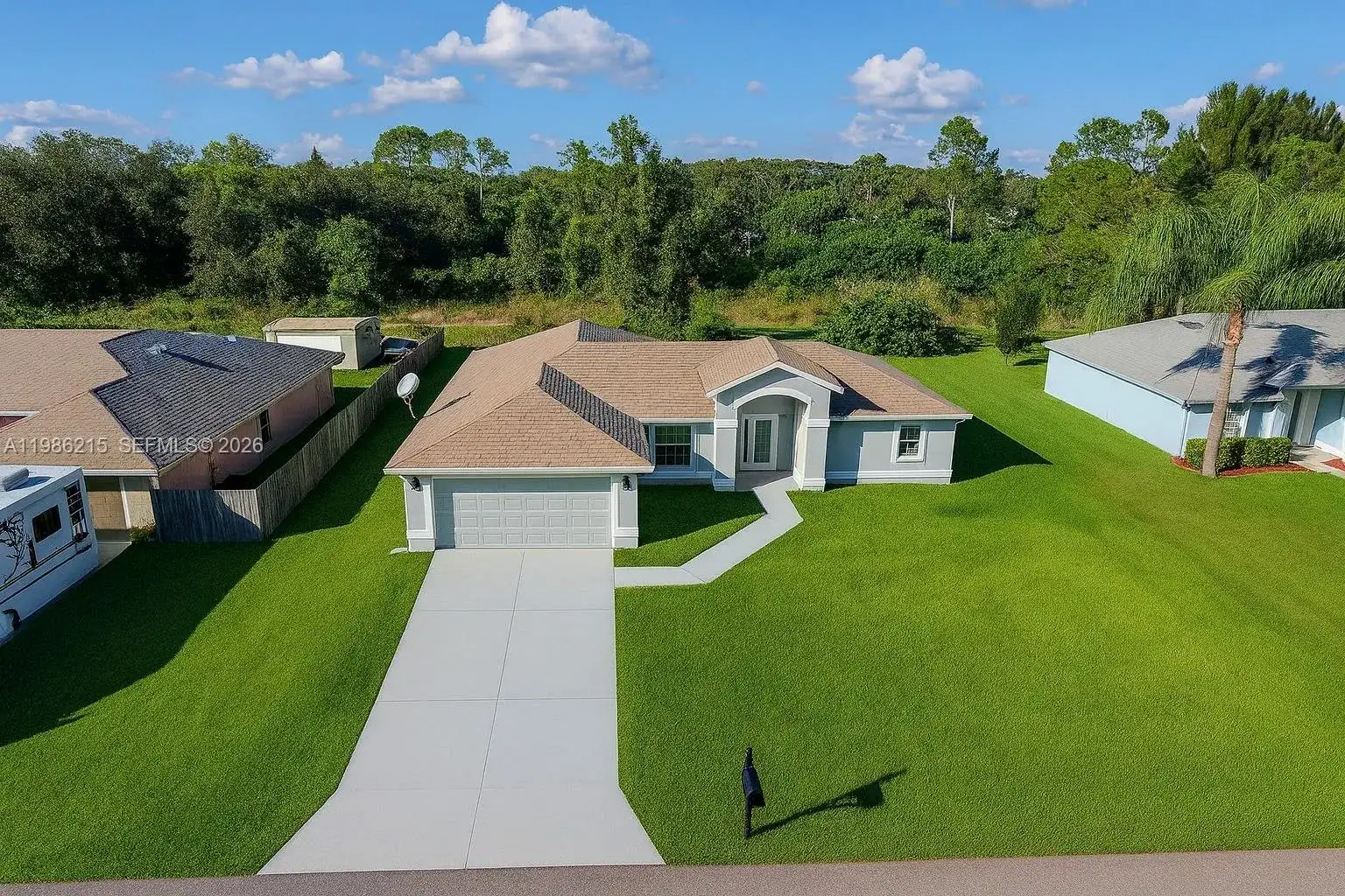 116 ridgemont Dr, Lehigh Acres FL 33972 photo 2