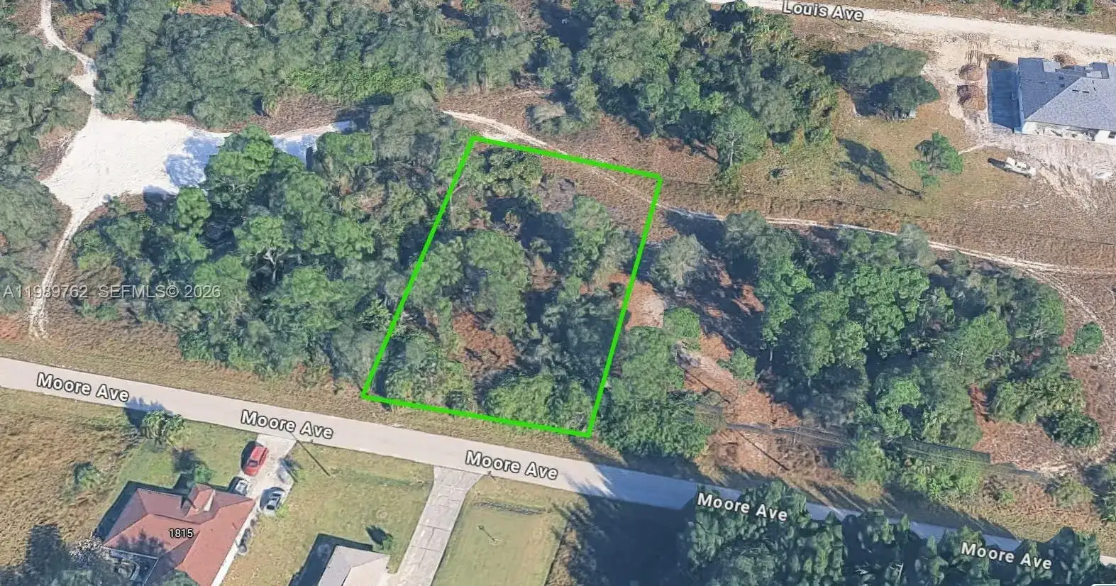 1812 MOORE AVE, Lehigh Acres FL 33972 photo 4