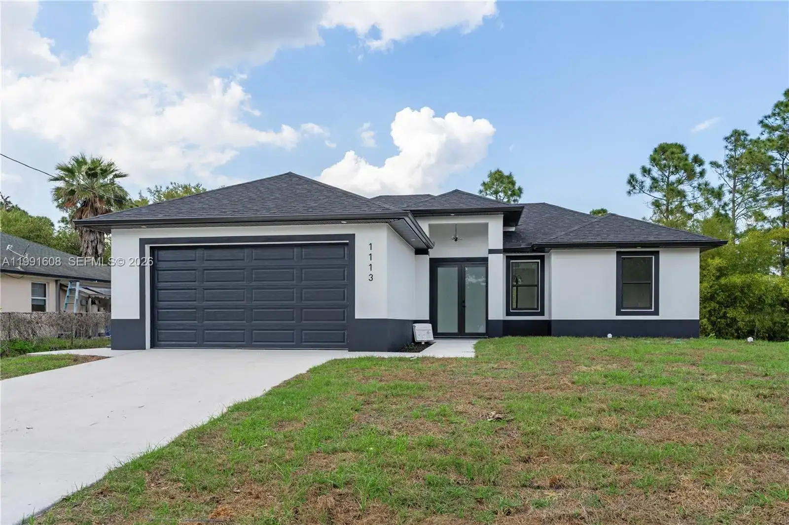 1113 ENRIQUE ST E, Lehigh Acres FL 33974 photo 2