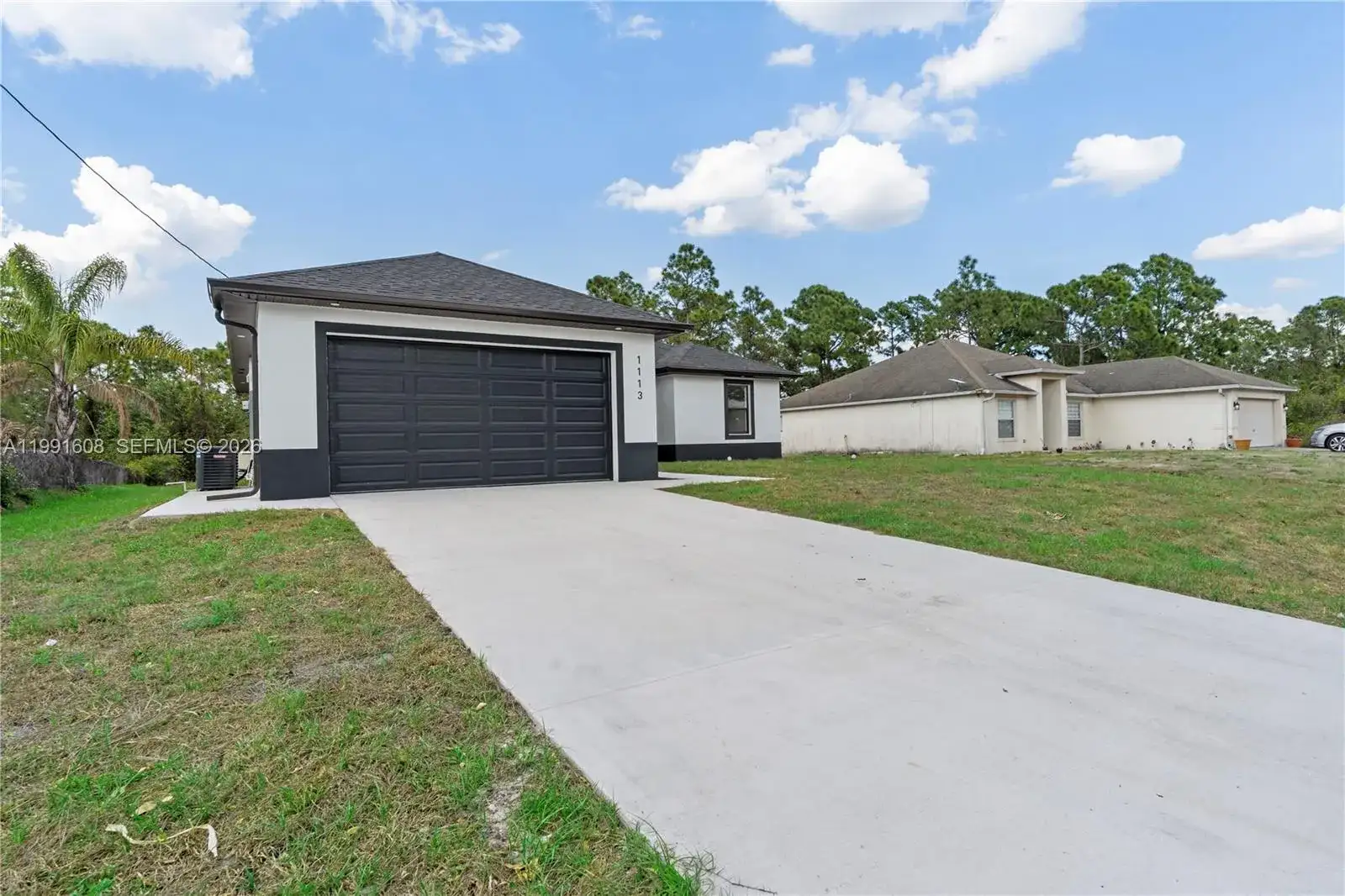 1113 ENRIQUE ST E, Lehigh Acres FL 33974 photo 3