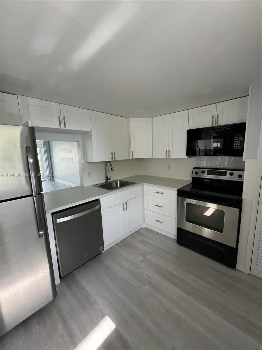 1398 NE 191st St # C305, Miami FL 33179 photo 2