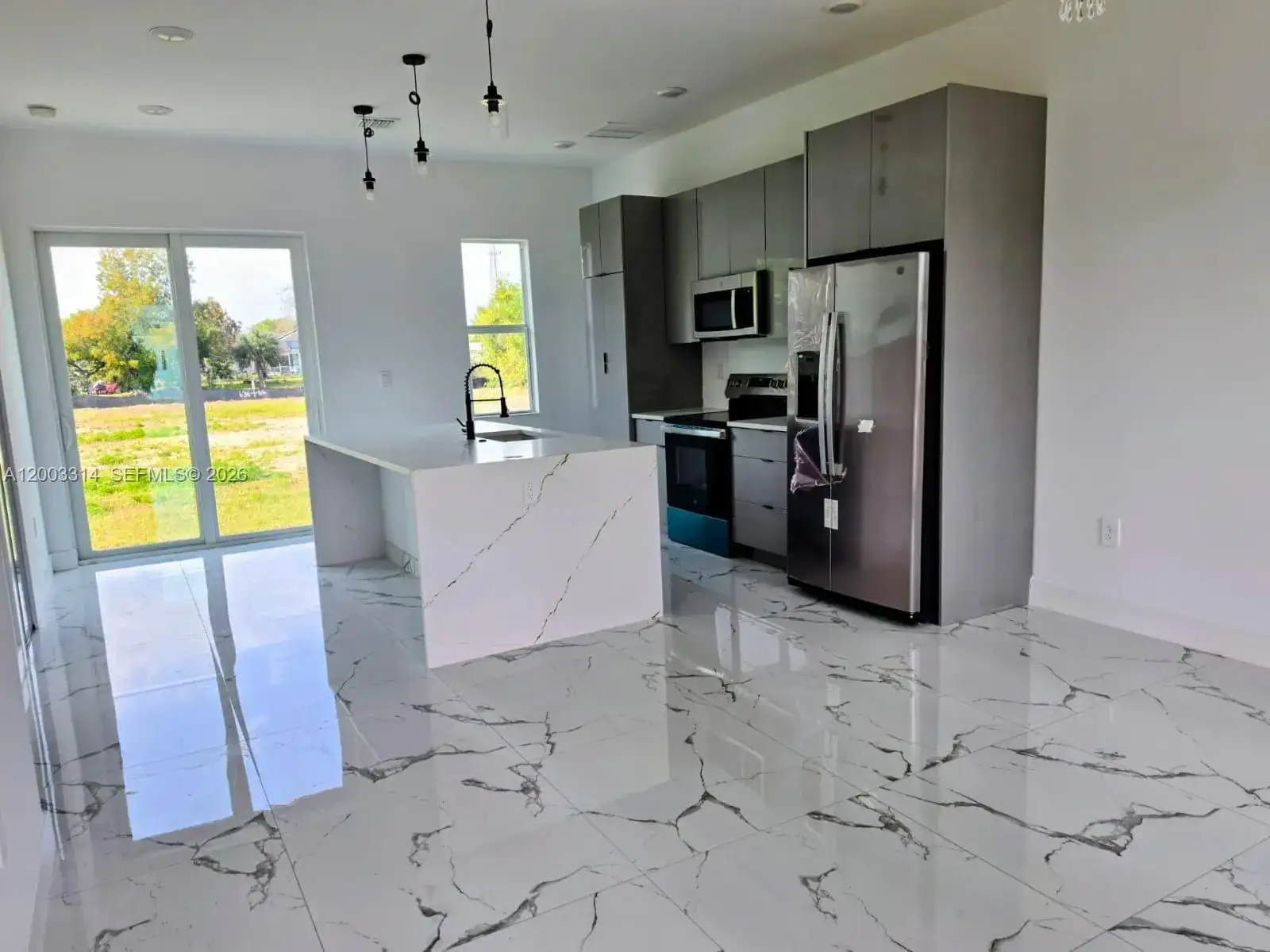 402 Harrison Dr, Lehigh Acres FL 33936 photo 2