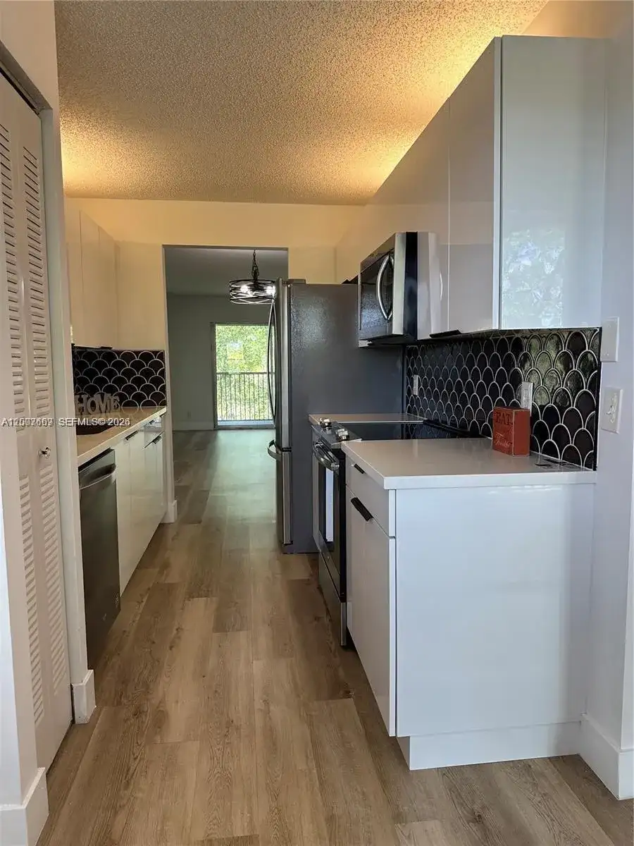 1300 SW 124th Ter # 408P, Pembroke Pines FL 33027 photo 3