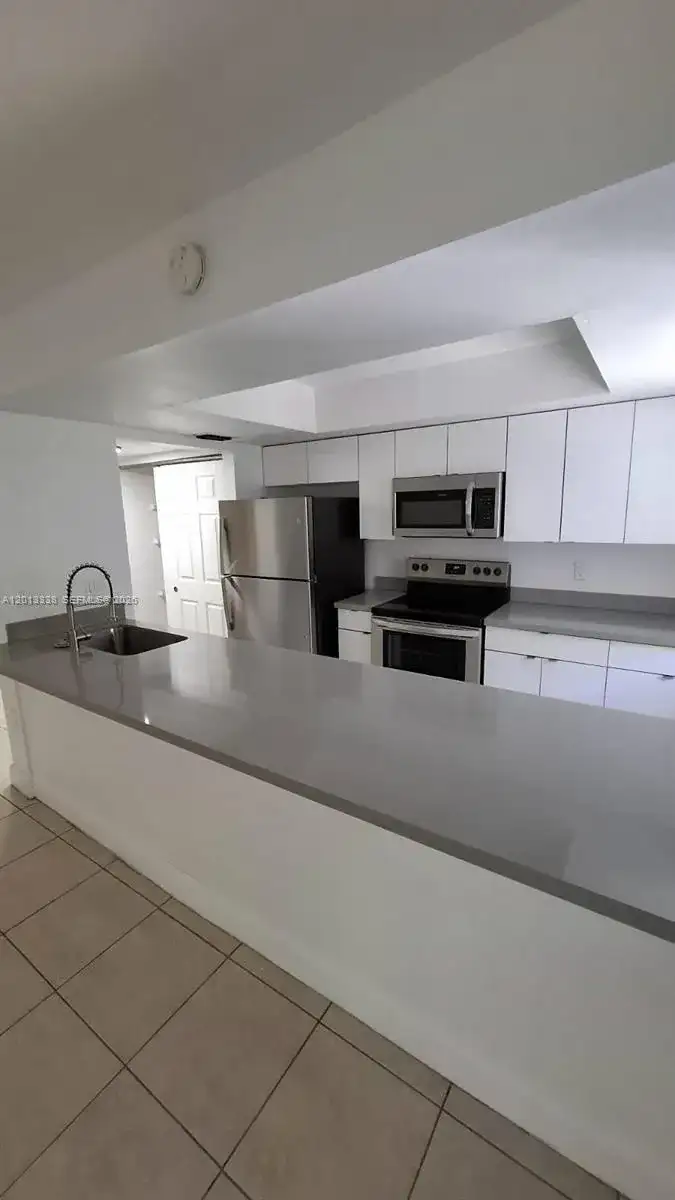 16220 NW 2nd Ave # 410, Miami FL 33169 photo 2