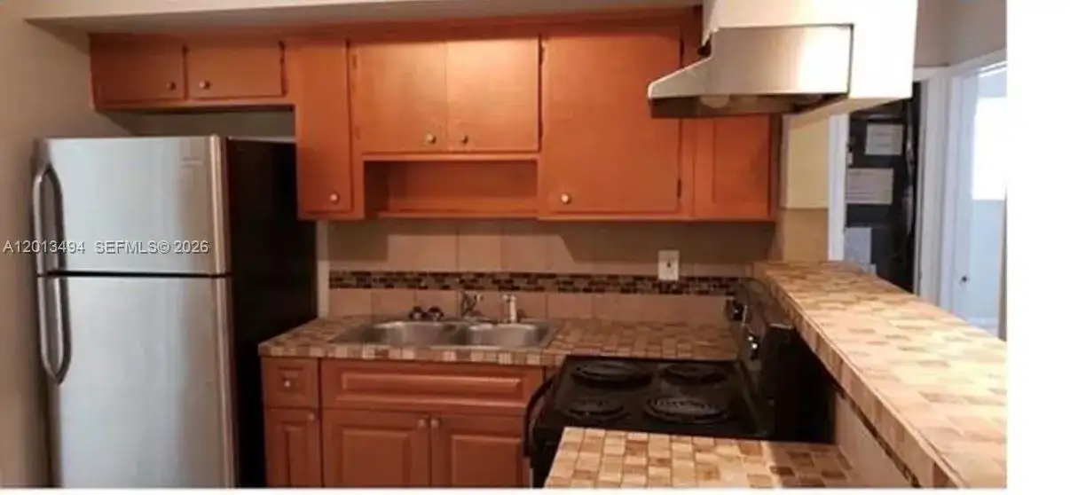 5631 SW 27th St, West Park FL 33023 photo 3