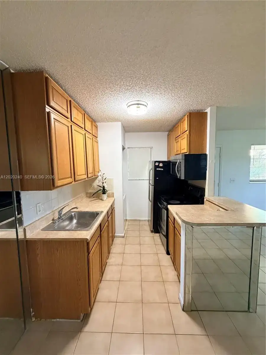 588 Trace Cir # 202, Deerfield Beach FL 33441 photo 3