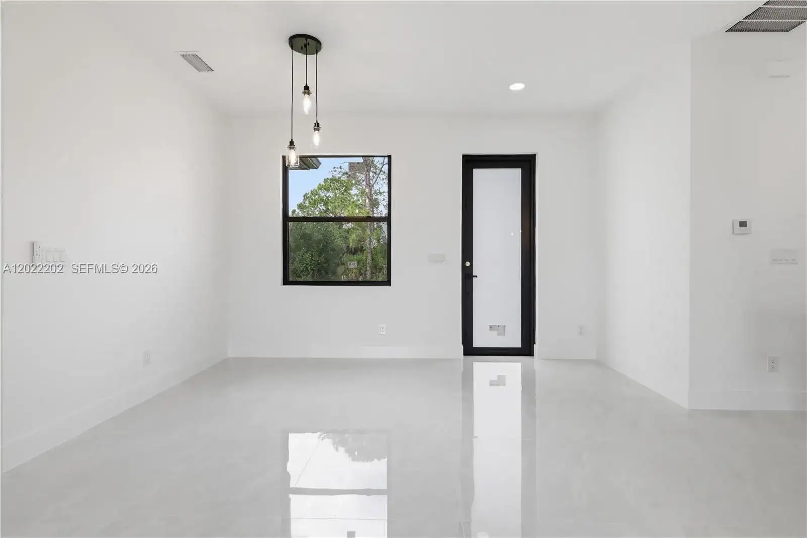 1222 Earnest St E, Lehigh Acres FL 33974 photo 3