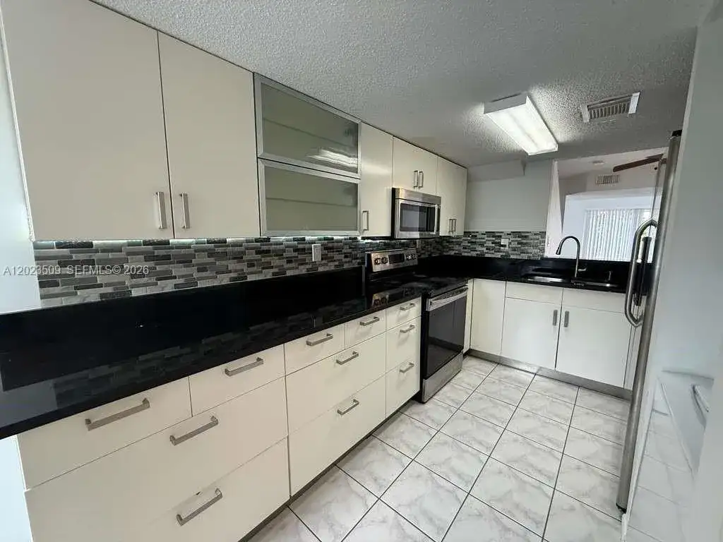 1137 NW 123rd Court # 610, Miami FL 33182 photo 2