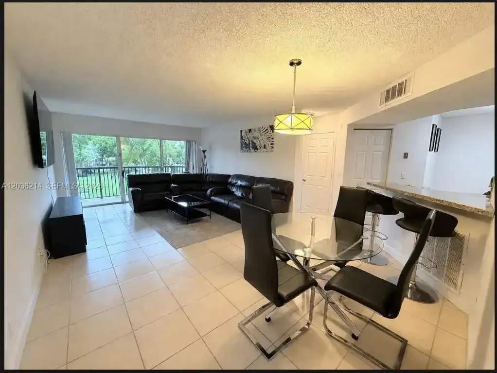 8741 Wiles Rd # 204, Coral Springs FL 33067 photo 2