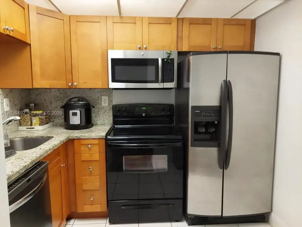 486 NW 165th St Rd # 103, Miami FL 33169 photo 2