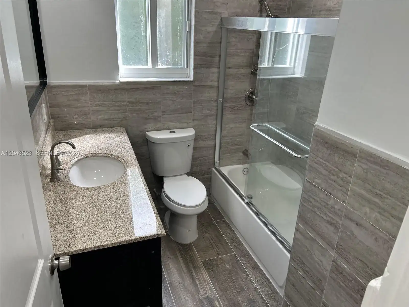 261 NW 49th St # A, Miami FL 33127 photo 2