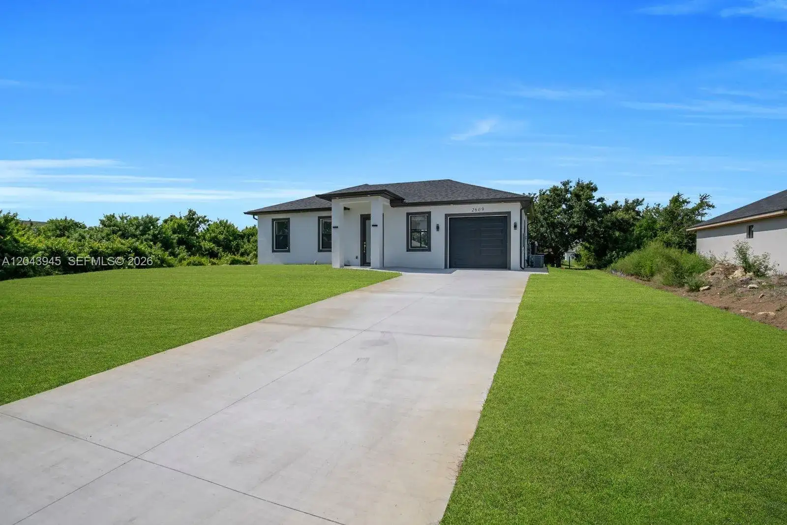2609 21st ST SW, Lehigh Acres FL 33976 photo 2