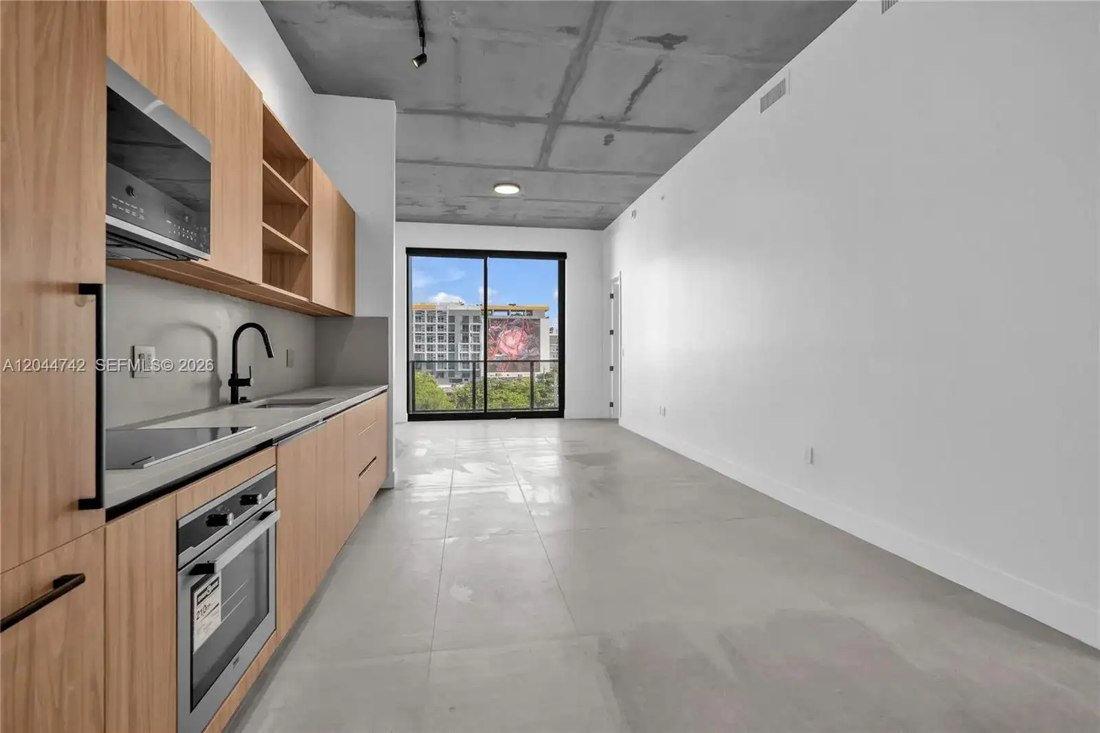 91 NW 27th St # 201, Miami FL 33127 photo 2