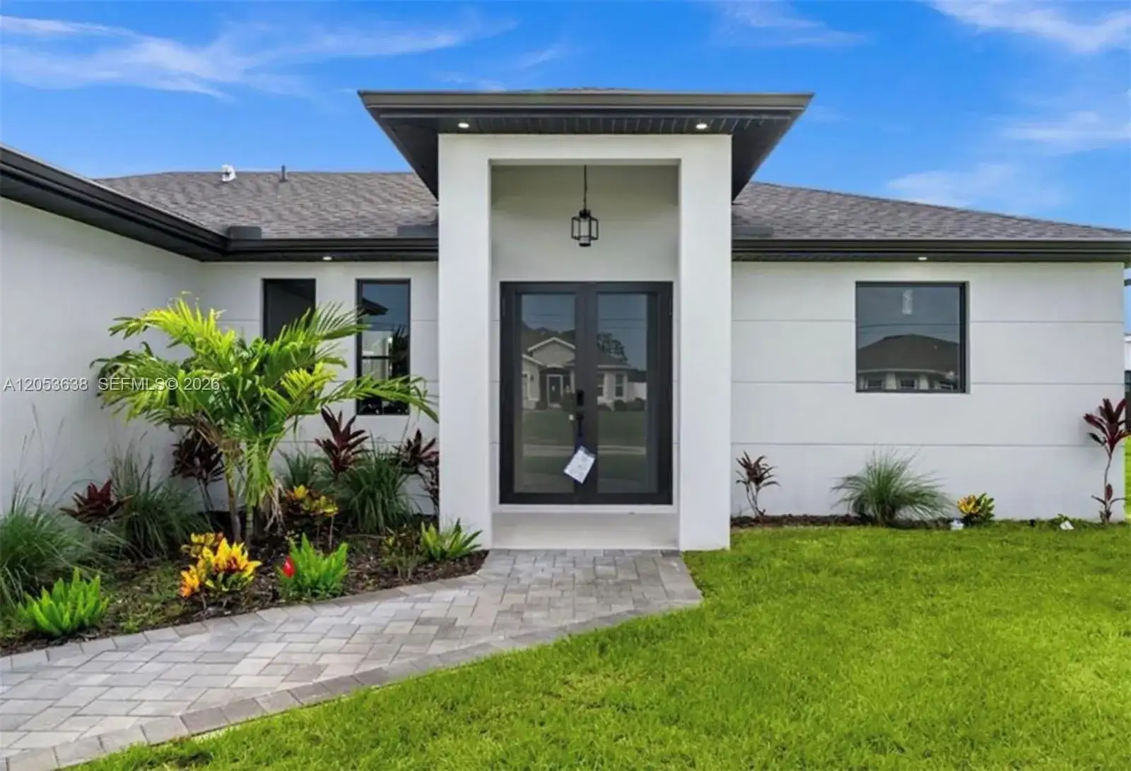 409 NW 25th PL, Cape Coral FL 33993 photo 2