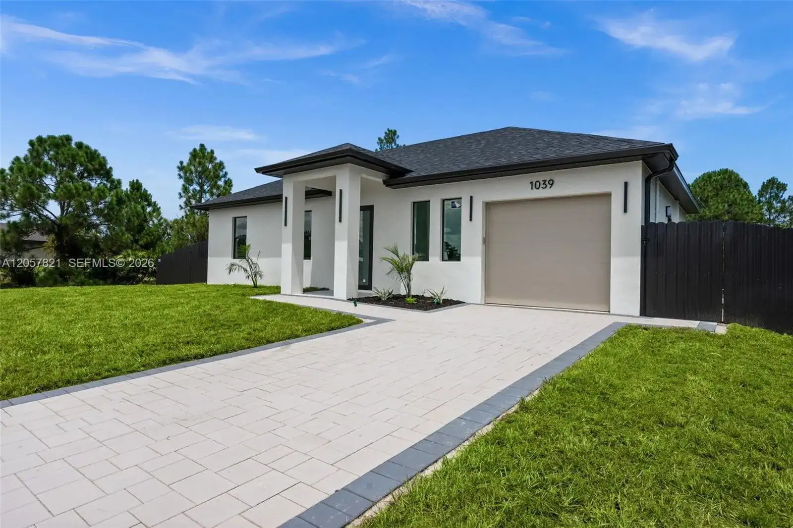 1039 Bassinger Ave S, Lehigh Acres FL 33974 photo 3