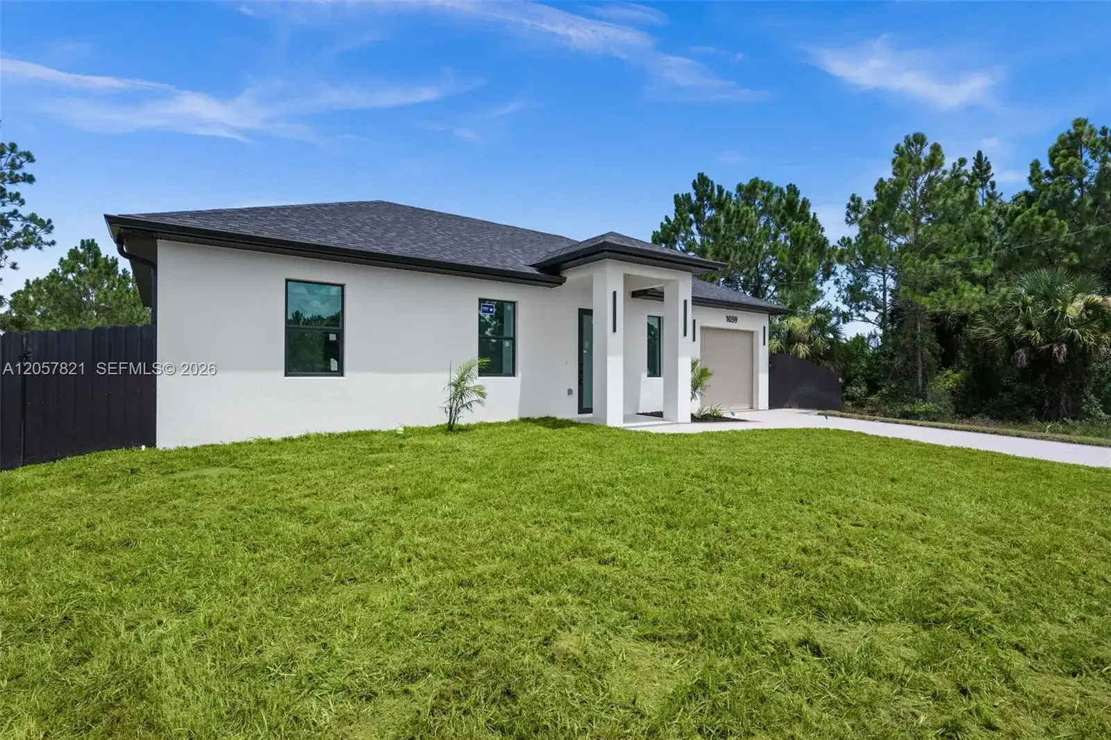 1039 Bassinger Ave S, Lehigh Acres FL 33974 photo 4