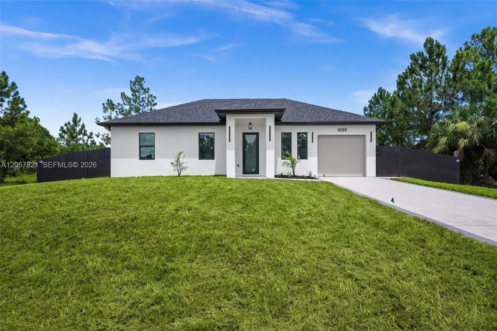 1039 Bassinger Ave S, Lehigh Acres FL 33974 photo 5