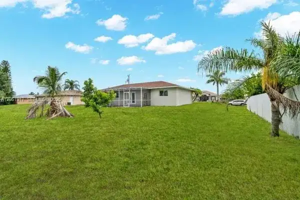 909 SALLY AVE NE, Lehigh Acres FL 33971 photo 2