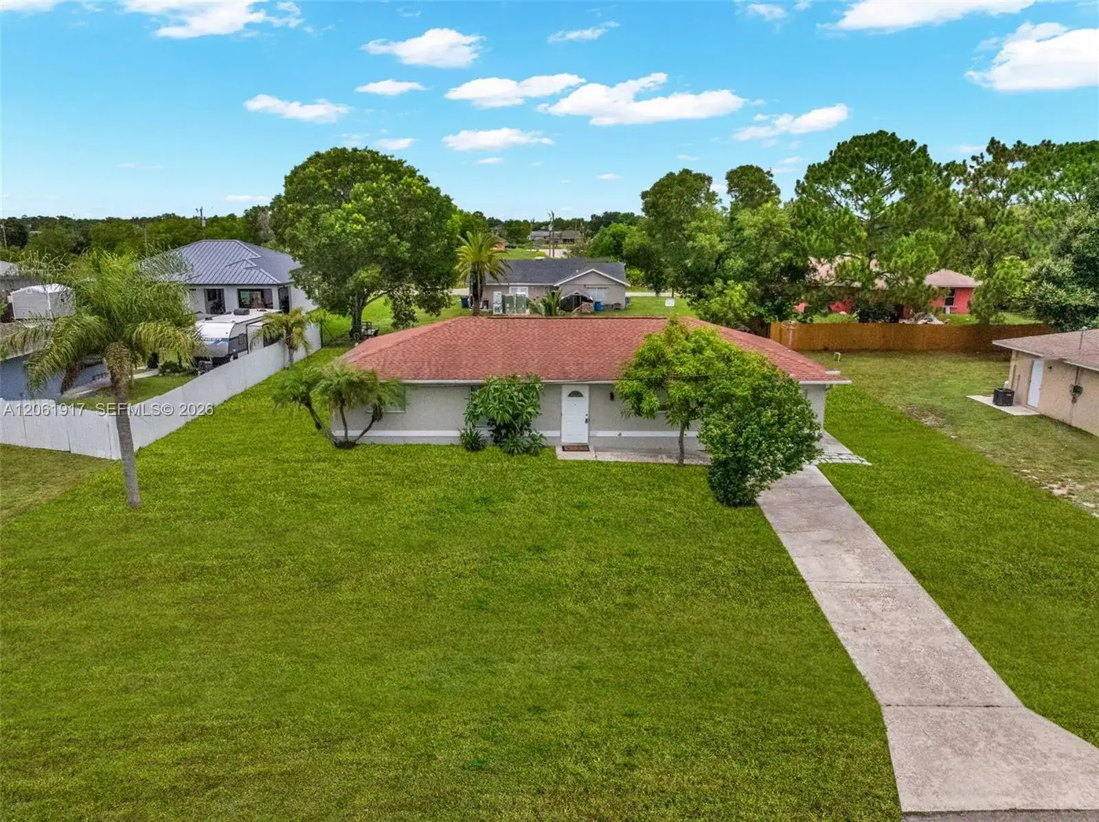 909 SALLY AVE NE, Lehigh Acres FL 33971 photo 3