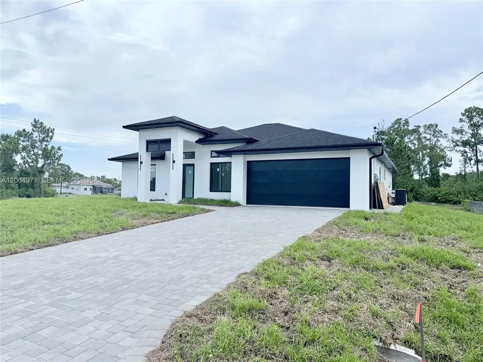 705 Colyer St E, Lehigh Acres FL 33974 photo 3