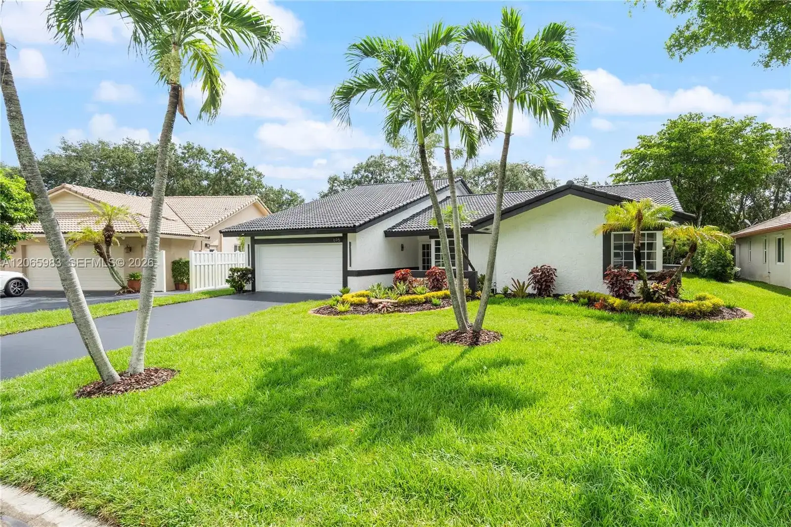 695 NW 107th Ln, Coral Springs FL 33071 photo 2