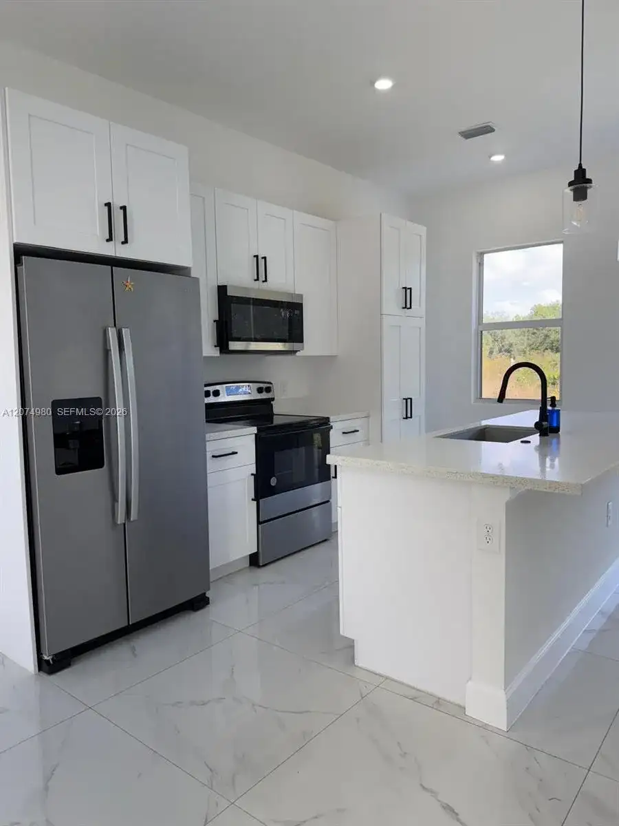 1832 Lindsay St, Lehigh Acres FL 33972 photo 2