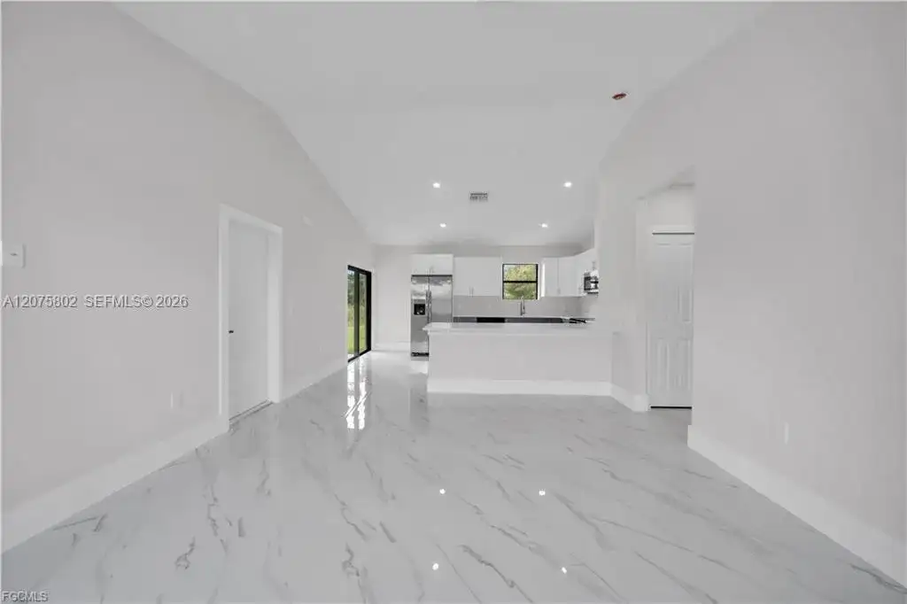 457 Woodman DR, Lehigh Acres FL 33972 photo 4