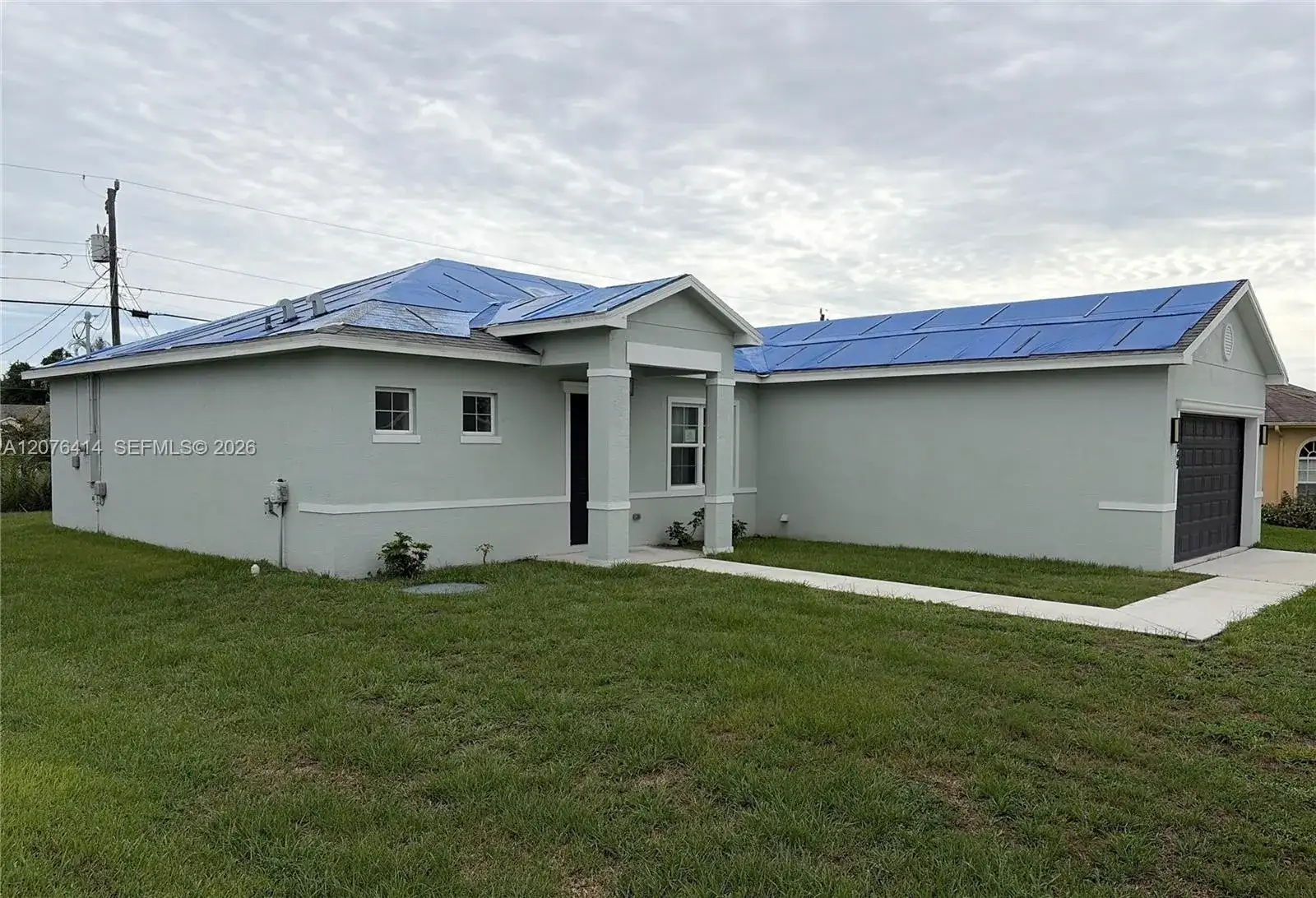 1649 SW Merchant Ln, Port St. Lucie FL 34953 photo 2