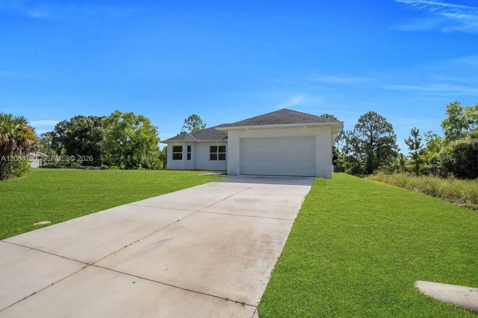523 Harry Thayer Ave S, Lehigh Acres FL 33974 photo 2