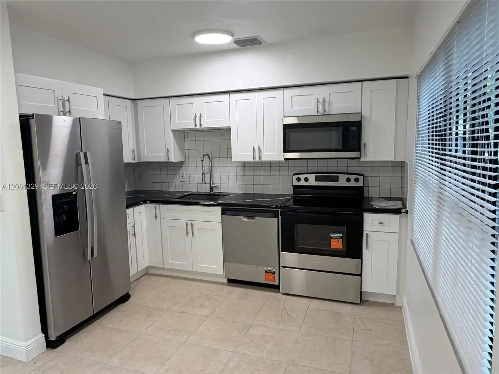 1311 NE 157 ST, North Miami Beach FL 33162 photo 3