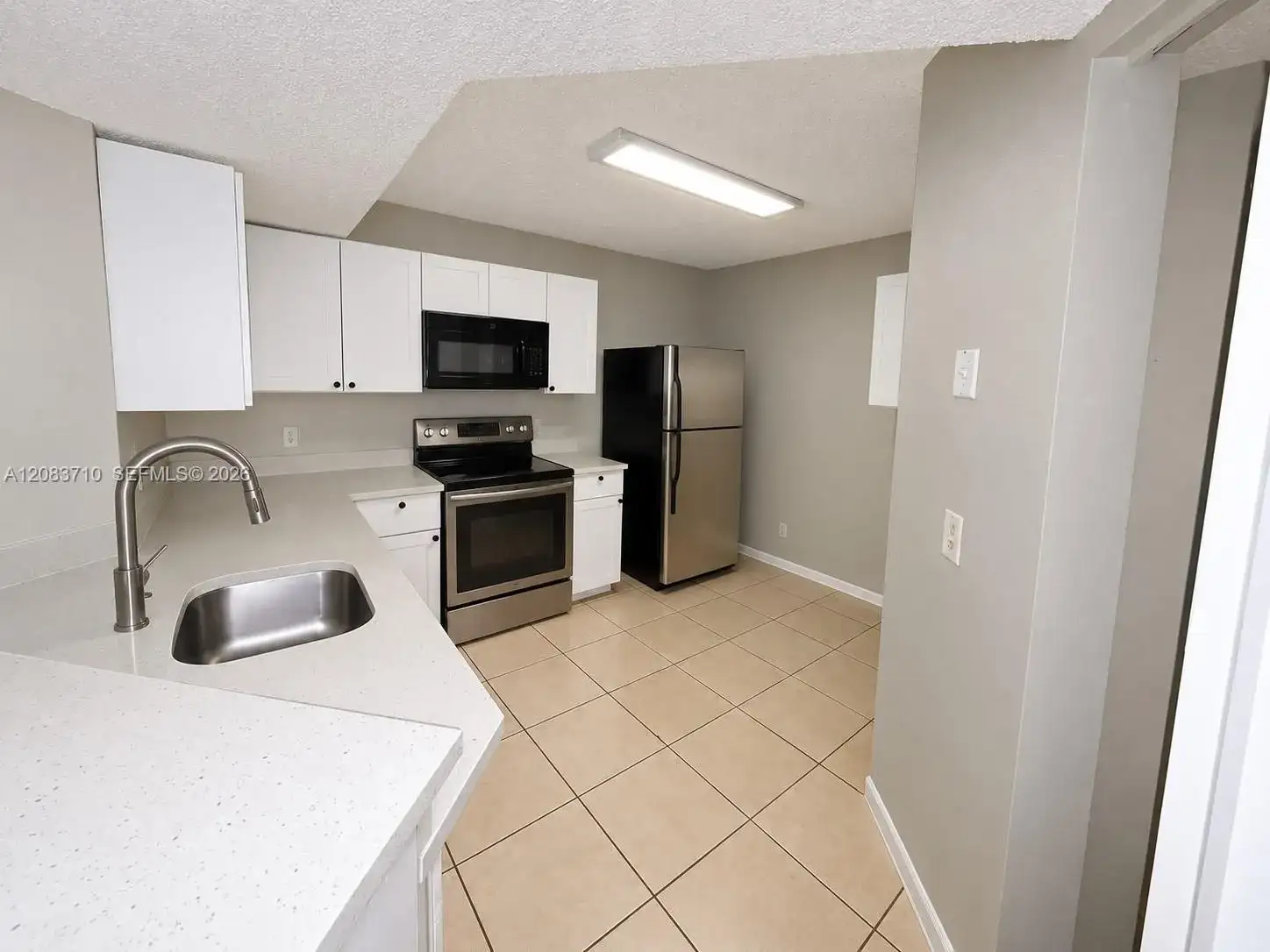 8821 Wiles Rd # 102, Coral Springs FL 33067 photo 2