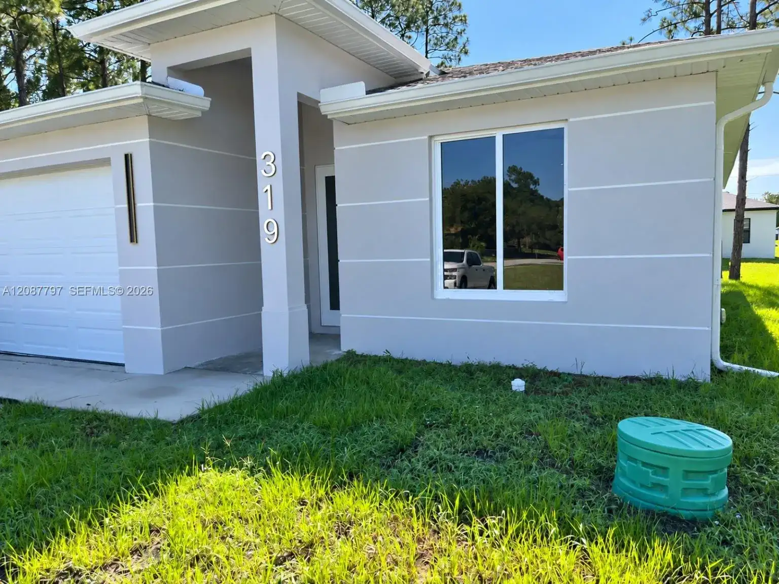 319 S Lorena Ave, Lehigh Acres FL 33974 photo 2