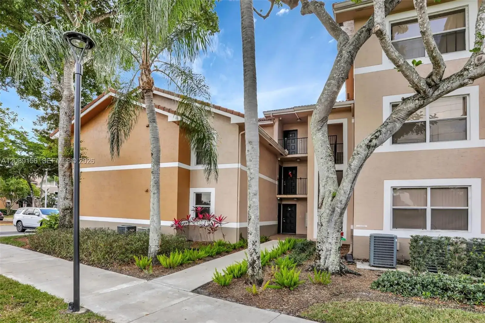 8891 Wiles Rd # 102, Coral Springs FL 33067 photo 2