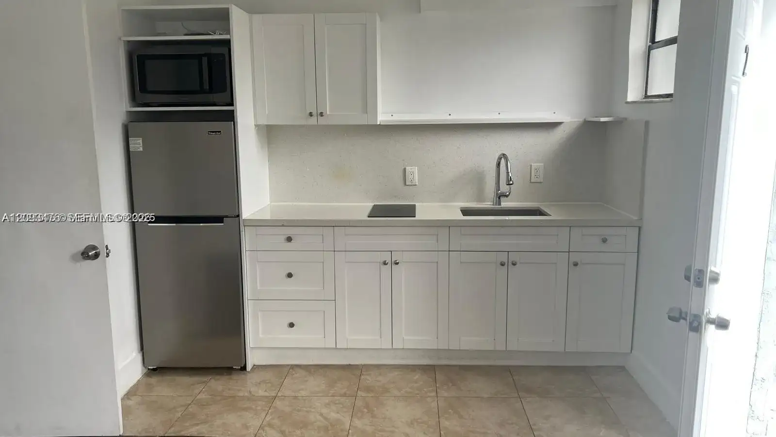 1053 NW 30th St # 2, Miami FL 33127 photo 2