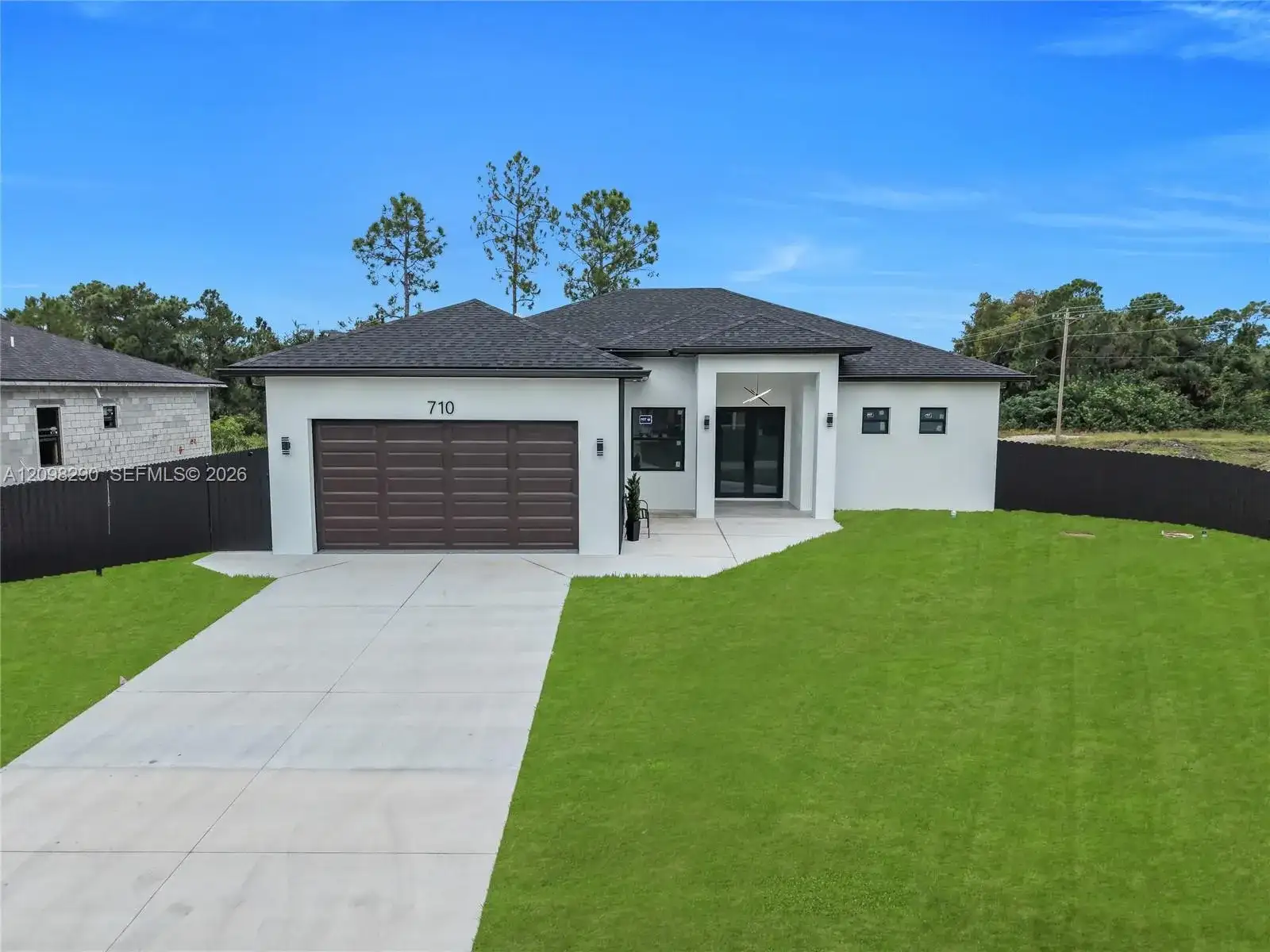 710 Almelia St E, Lehigh Acres FL 33974 photo 2