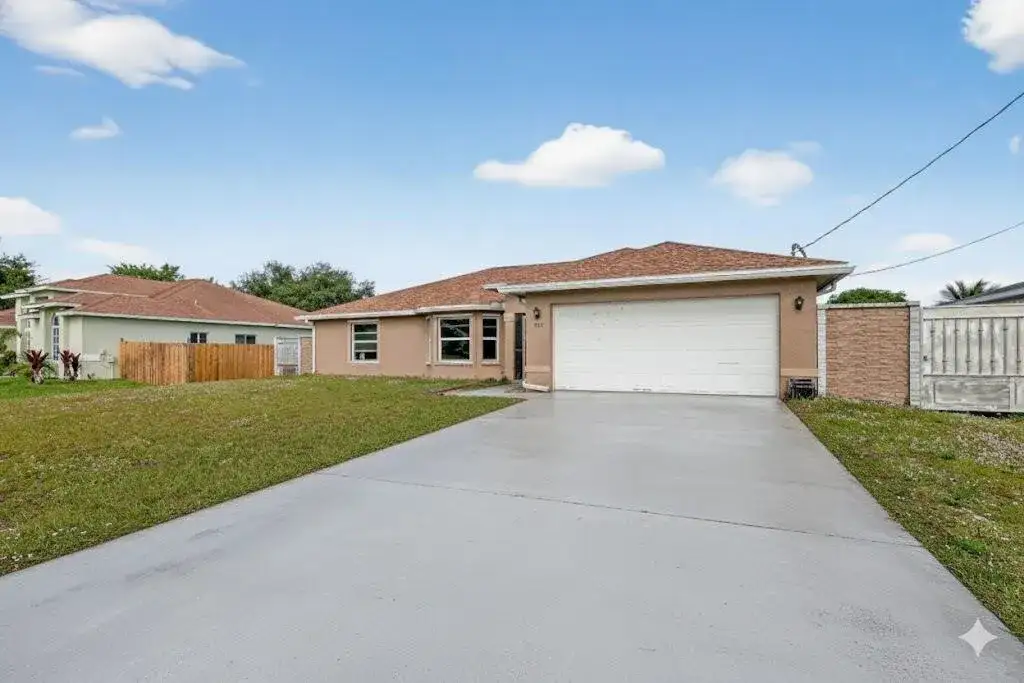 557 SW Halkell Avenue, Port St. Lucie FL 34953 photo 2