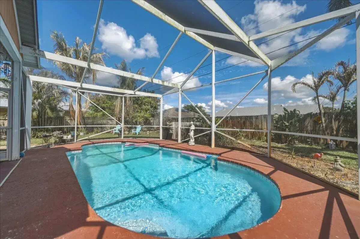 437 SW Kaabe Avenue, Port St. Lucie FL 34953 photo 2