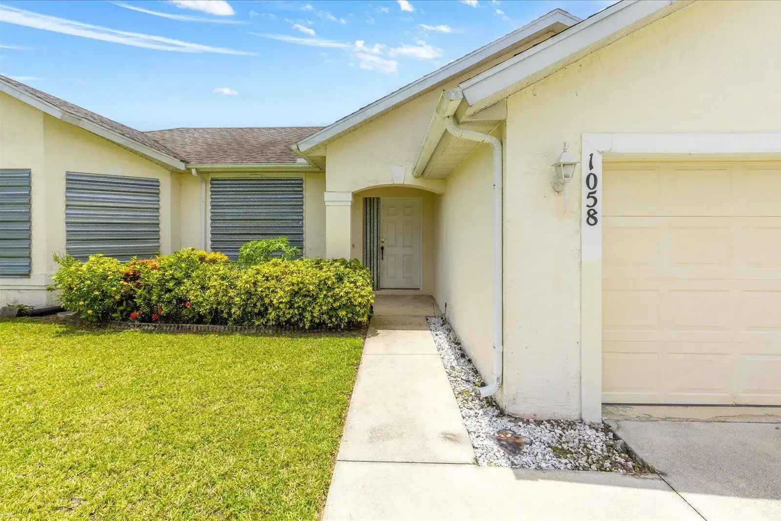 1058 SW Locke Avenue, Port St. Lucie FL 34953 photo 2