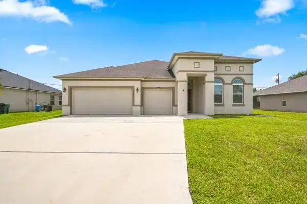 1957 SW LOGAN Street, Port St. Lucie FL 34953 photo 2