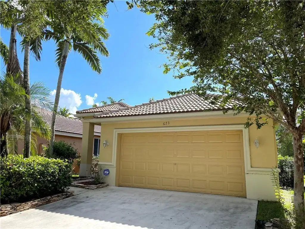 673 CONSERVATION Drive, Weston FL 33327 photo 2
