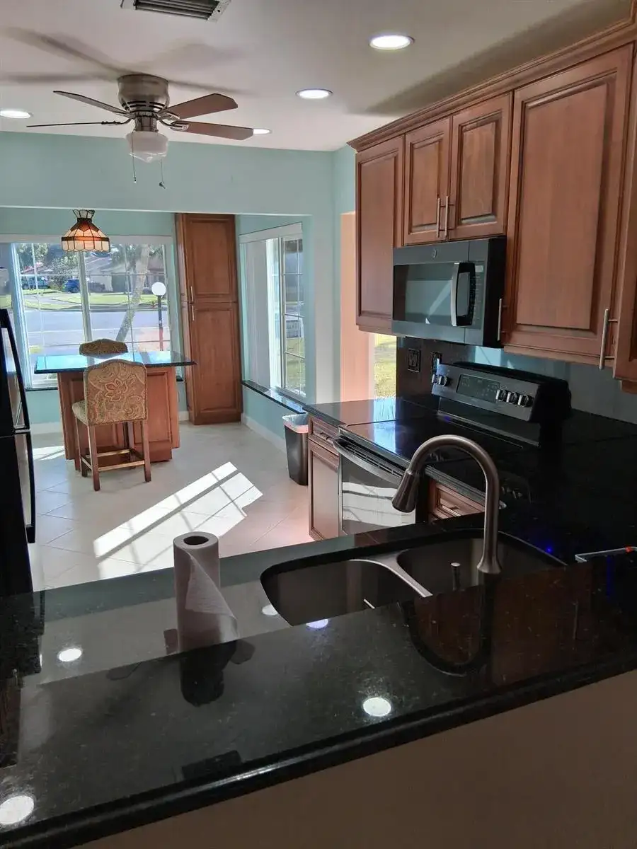 4703 Rainbow Drive, FL 33463 photo 2